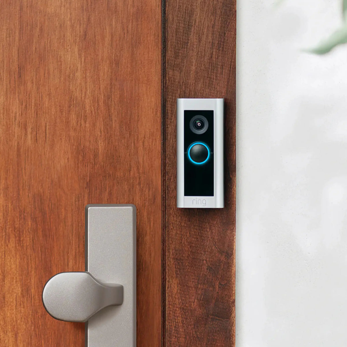 Ring Doorbell Pro 2 Plug-In mounted on wooden door frame
